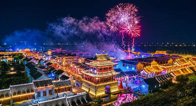 Fireworks Over a Lantern-Lit Ancient Town.png